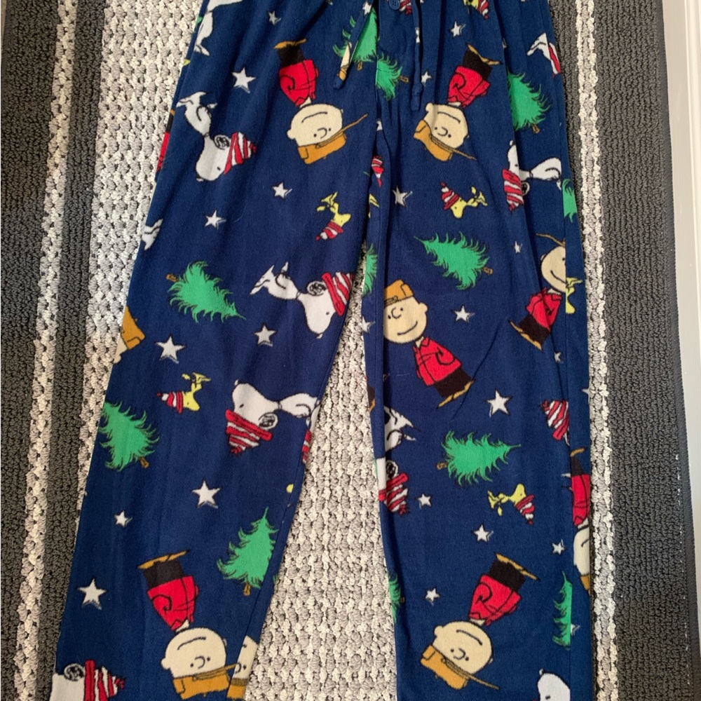 Navy blue Peanuts pajama pants100% polyester has pockets and a tieable waistband